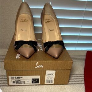 Christian Louboutin Cream and Black Heels Signature Design